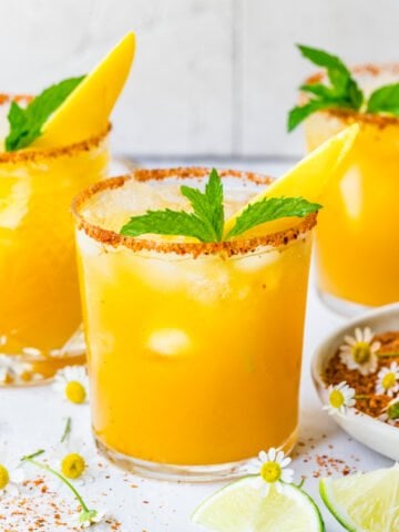 Close up view of finished mango margaritas.