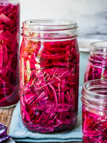 Close up of finished pickled red cabbage in jars.