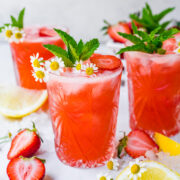 Close up of finished strawberry mocktails with garnish.