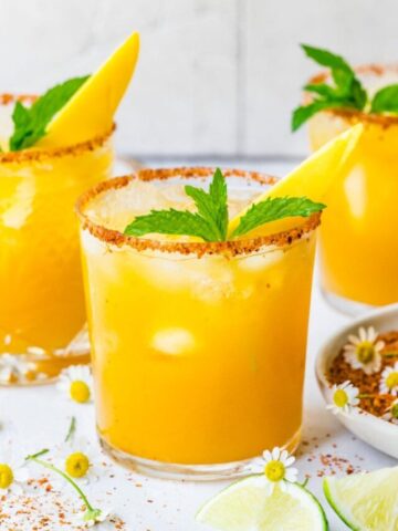 Close up view of finished mango margaritas.