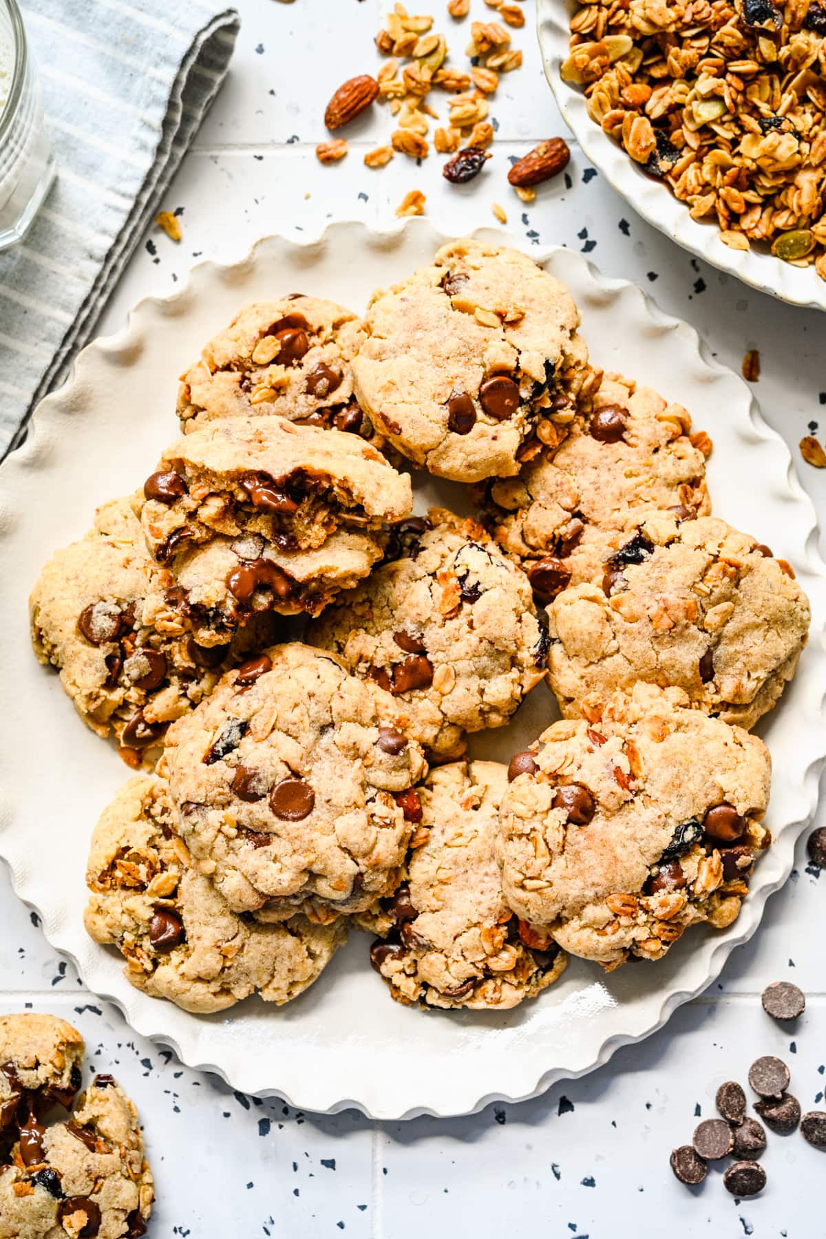 Finished granola cookies on a white plate.