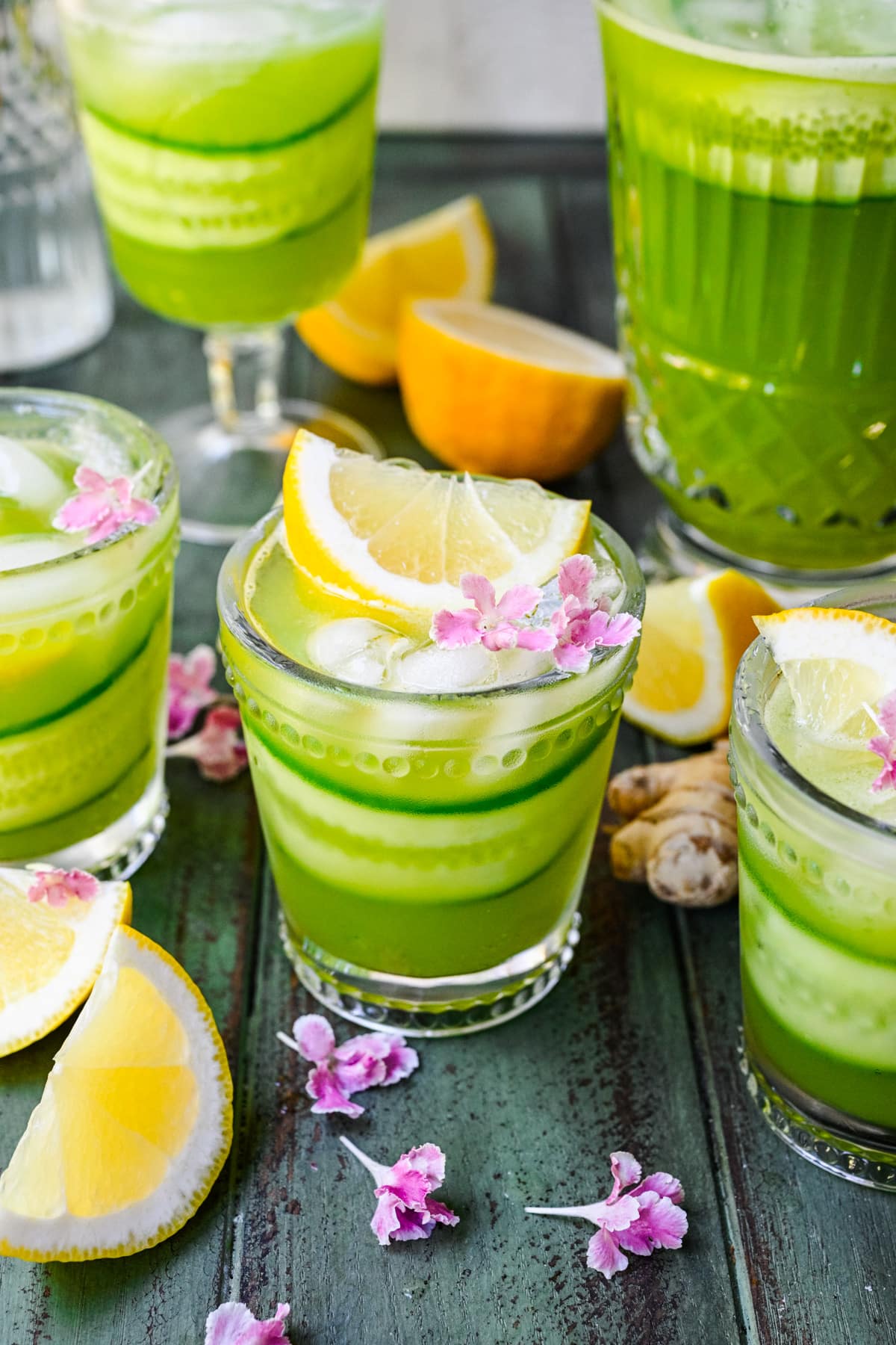 Close up view of cucumber ginger lemonade in a glass.