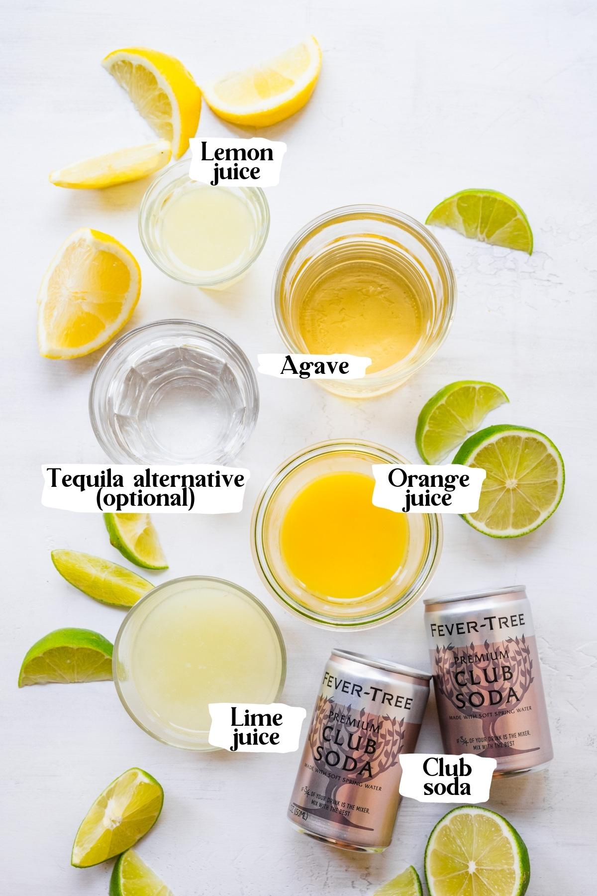 Overhead view of ingredients for margarita mocktail, including citrus juice and club soda. 