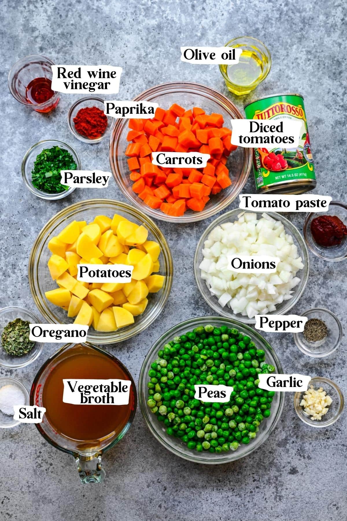 Overhead view of pea stew ingredients, including peas, carrots, and potatoes.