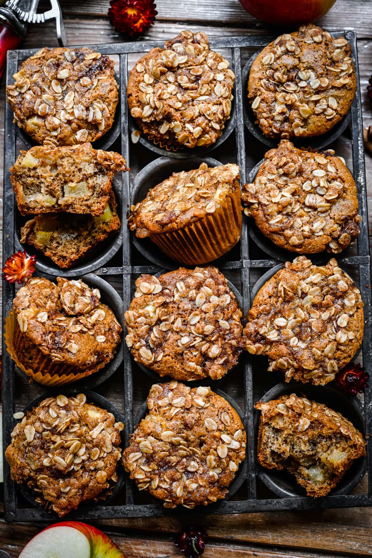 Overhead view of vegan apple muffins in a tin.