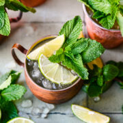 Overhead view of kentucky mule with lime and mint garnish.