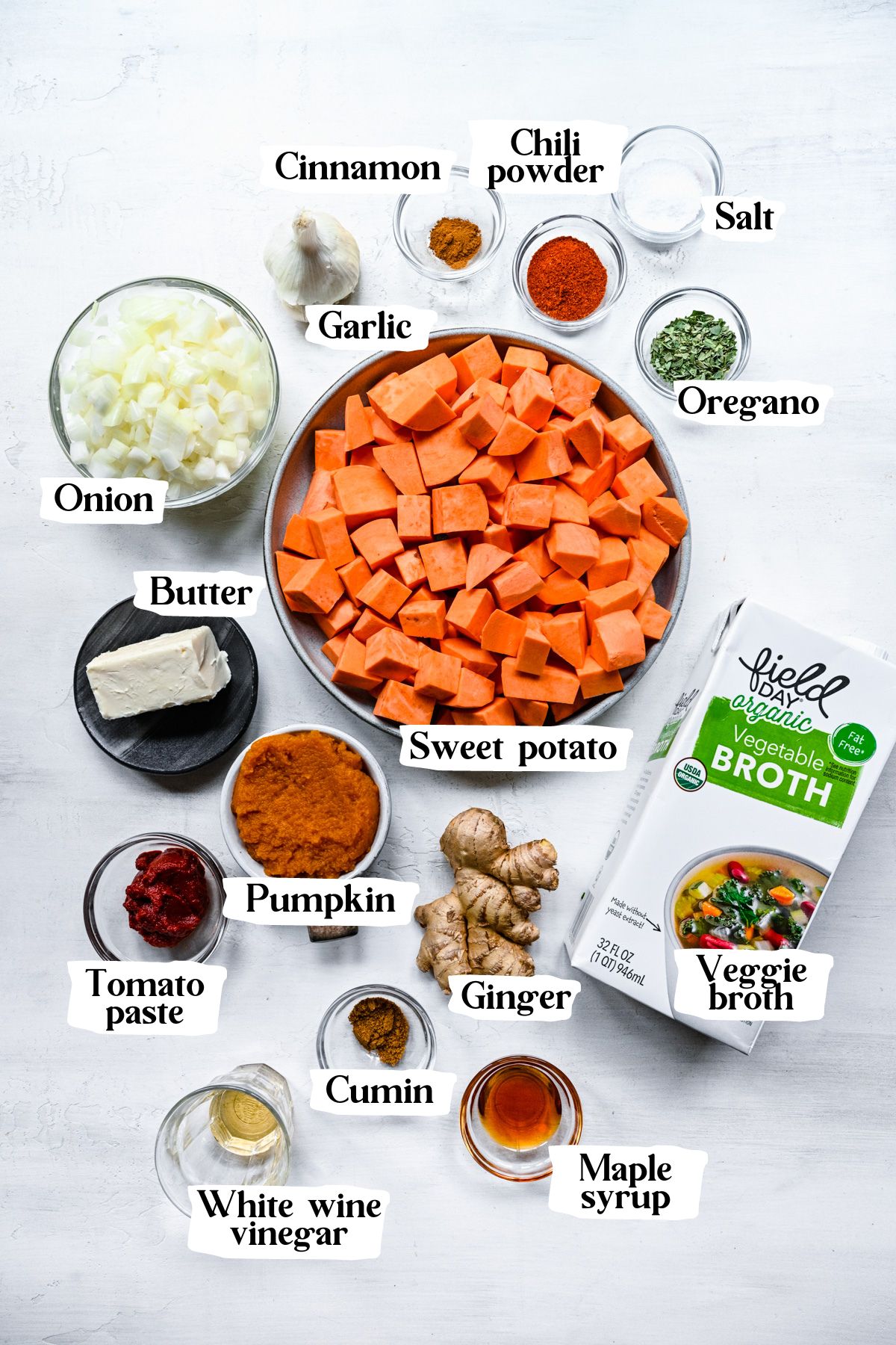 Pumpkin sweet potato soup ingredients including veggie broth and garlic.