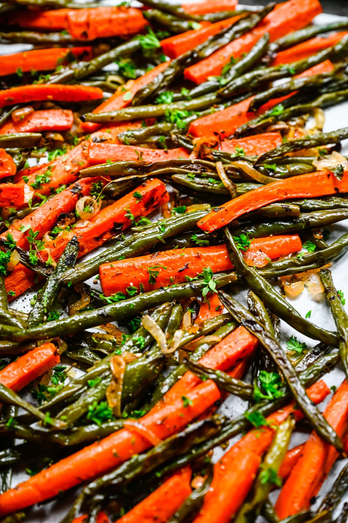 Close up of the finished roasted green beans and carrots.