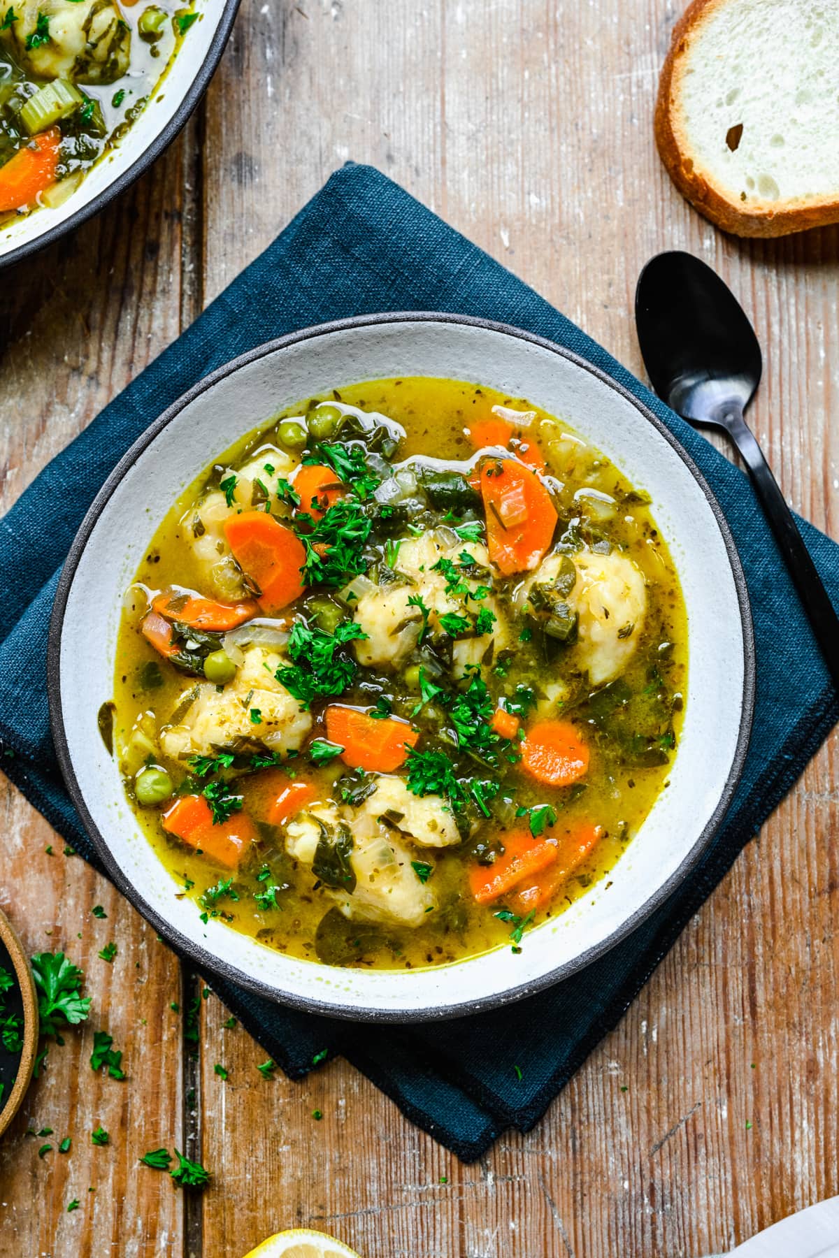 Finished vegetable dumpling soup in a bowl.