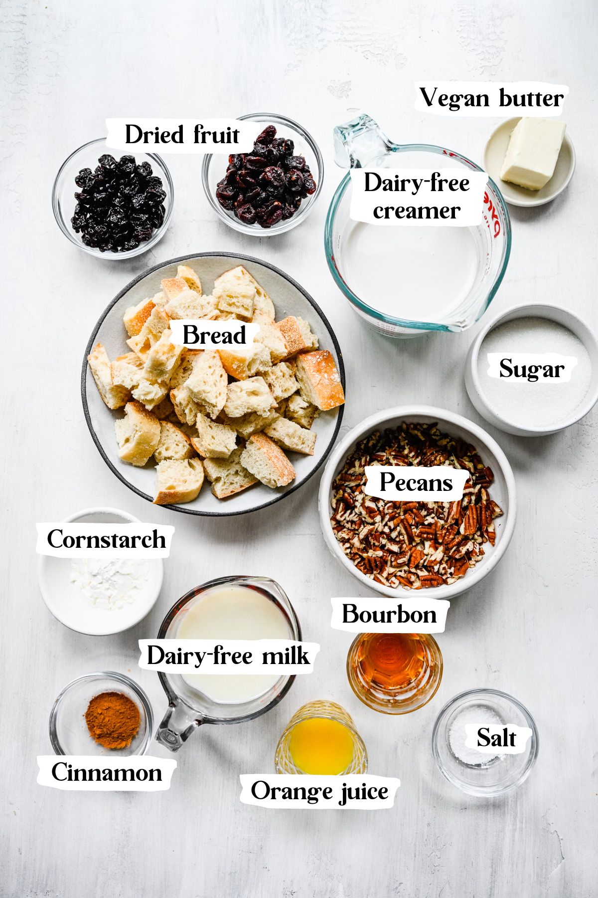 Bread pudding ingredients including pecans and dried fruit.