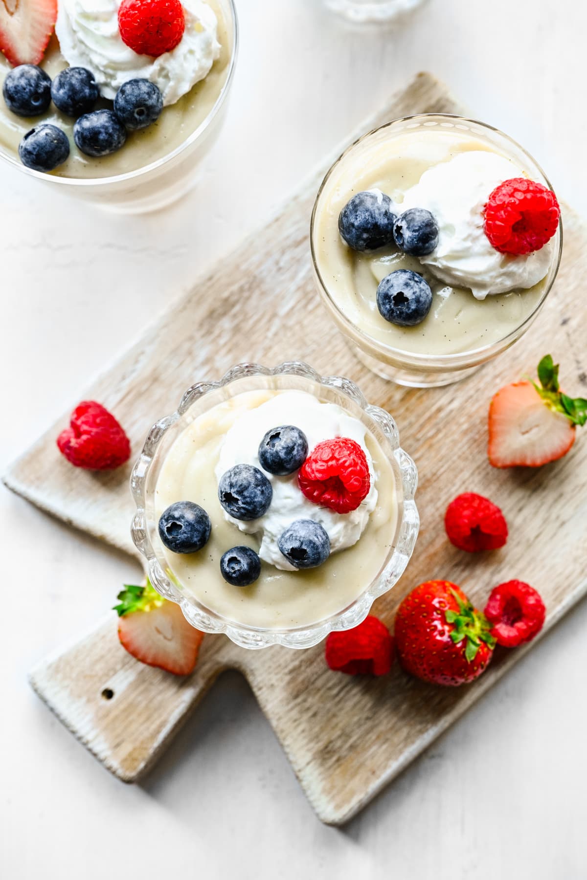 Overhead of the finished pudding in little glasses.