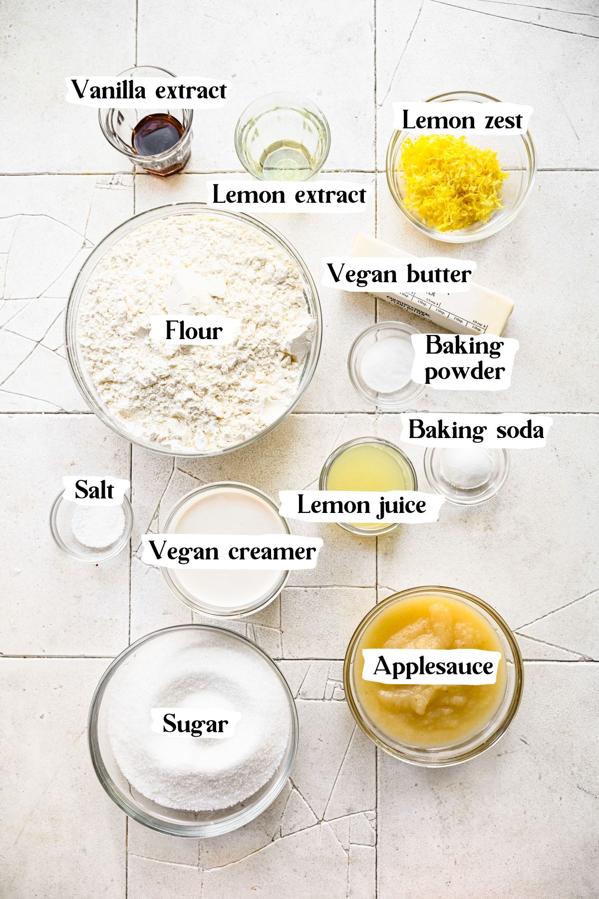 Vegan lemon cake ingredients including lemon juice and applesauce.