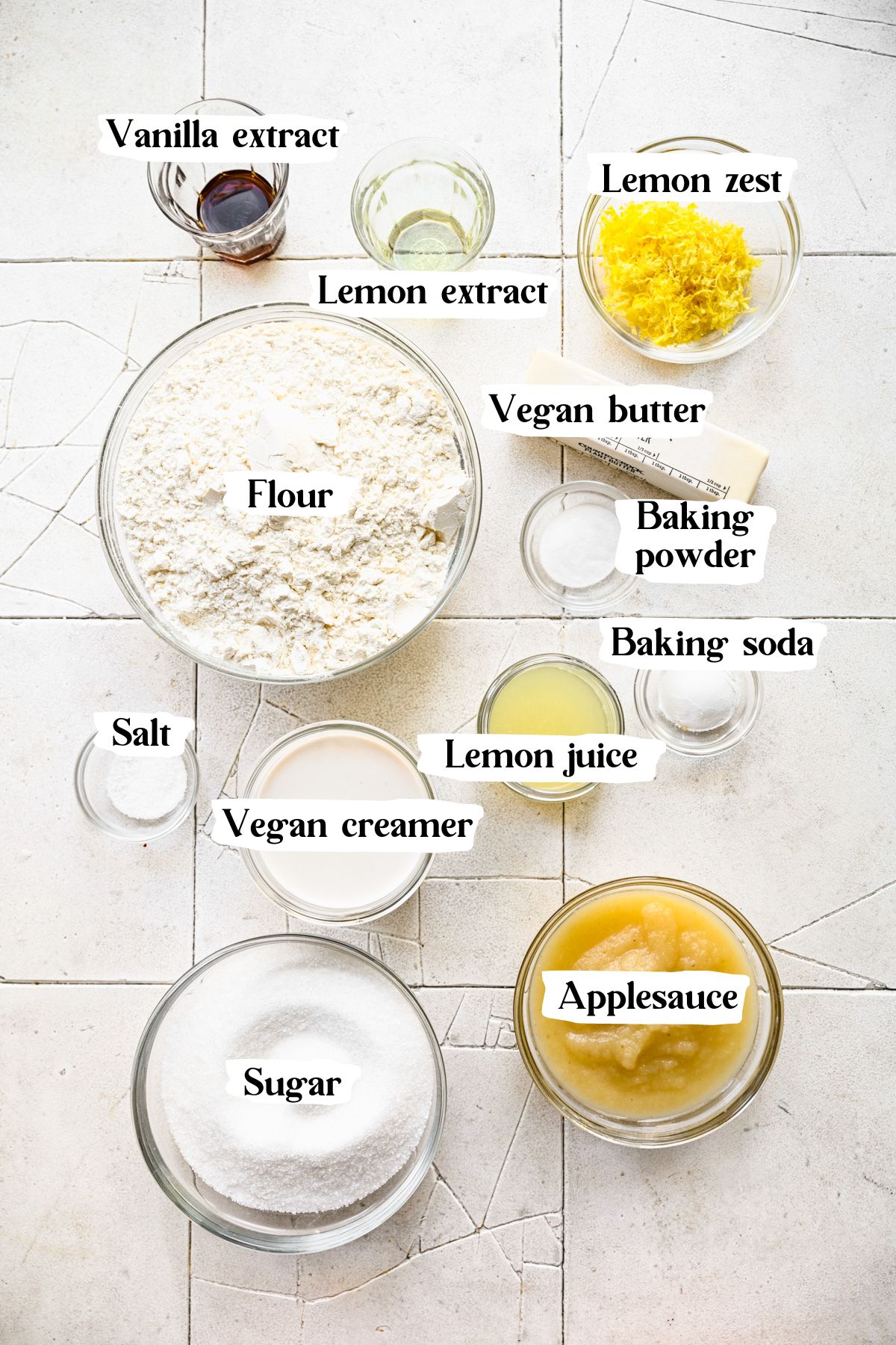 Vegan lemon cake ingredients including lemon juice and applesauce.
