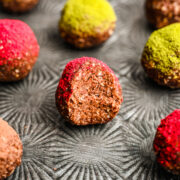 Close up of the interior of the chocolate bliss balls on a silver tray.