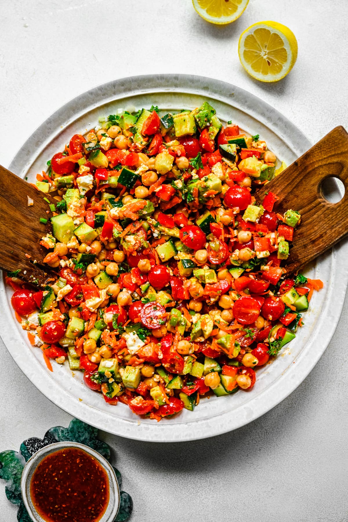 Overhead view of salad dressed with harissa vinaigrette.