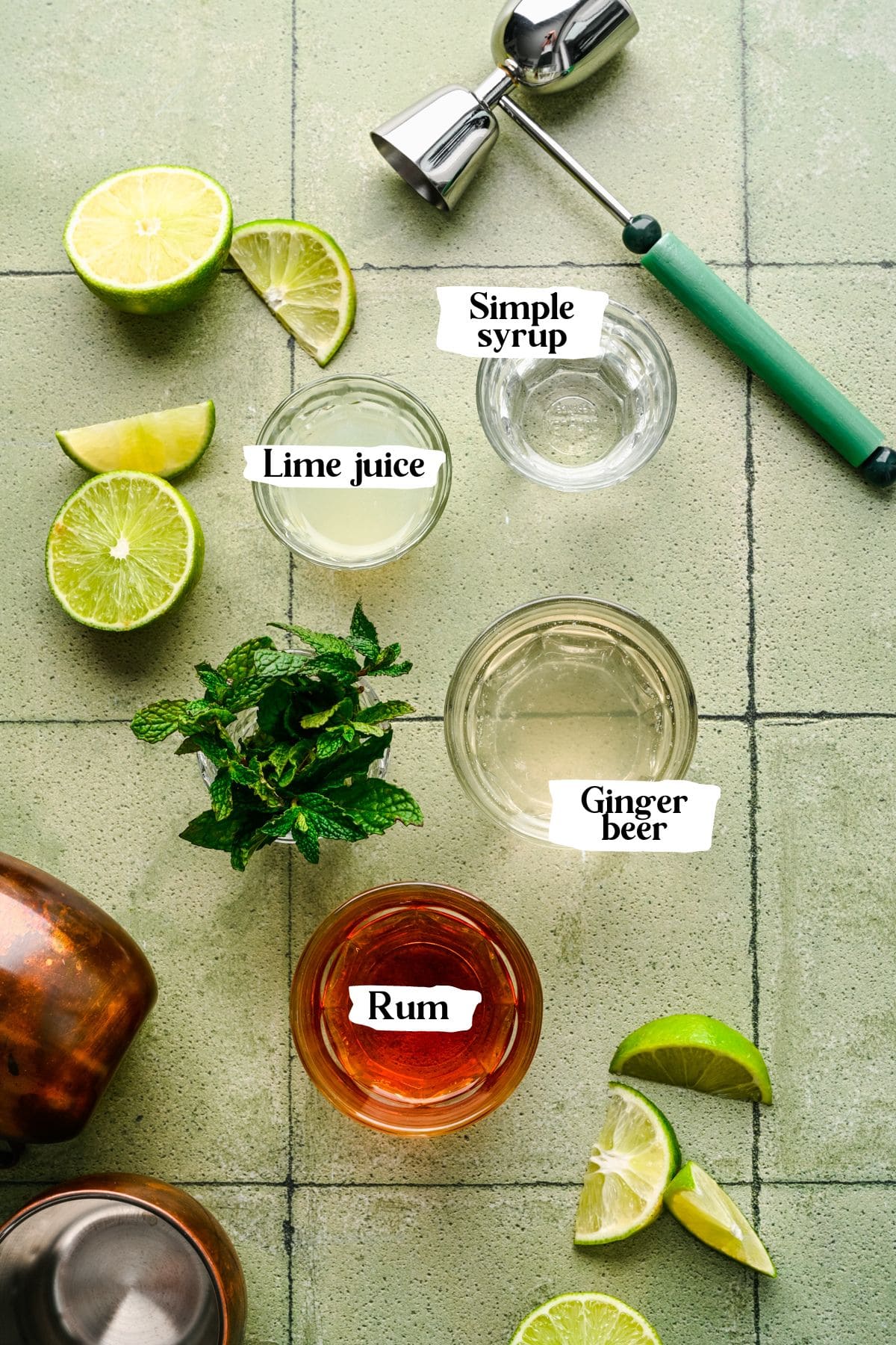 Rum Moscow Mule ingredients including lime juice and ginger beer.