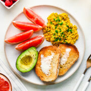 Overhead of the finished silken tofu scramble on a brunch plate.