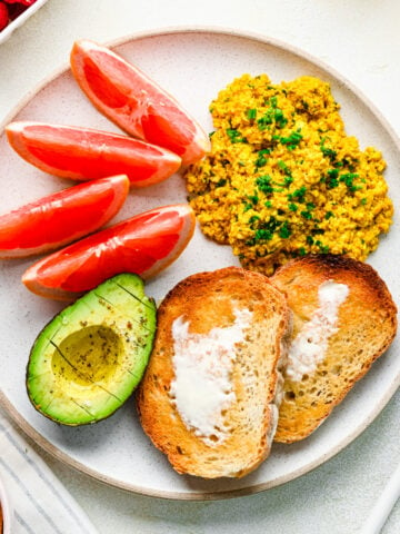 Overhead of the finished silken tofu scramble on a brunch plate.