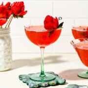 Close up of the finished strawberry martini with a strawberry rose.
