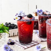Front view of the finished blackberry bourbon smash cocktails.
