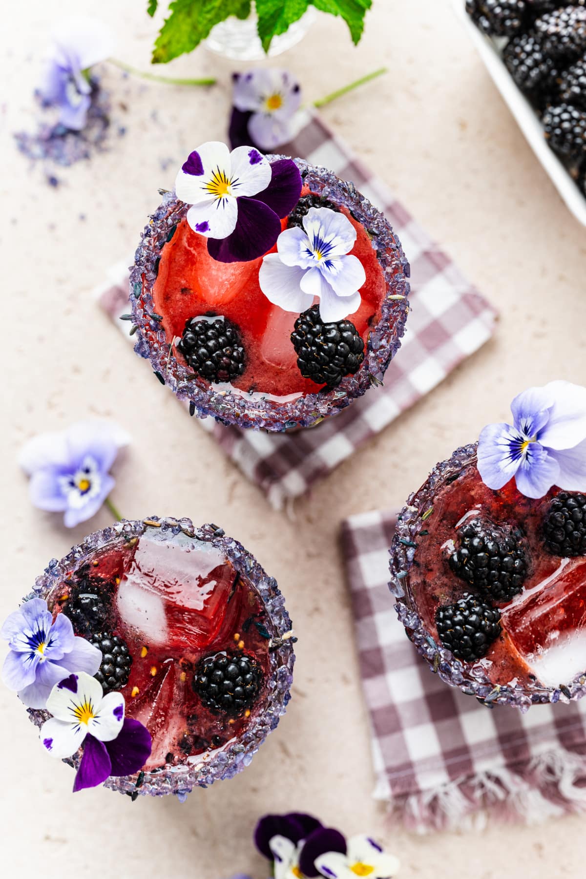 Overhead of the finished blackberry bourbon smash cocktails.