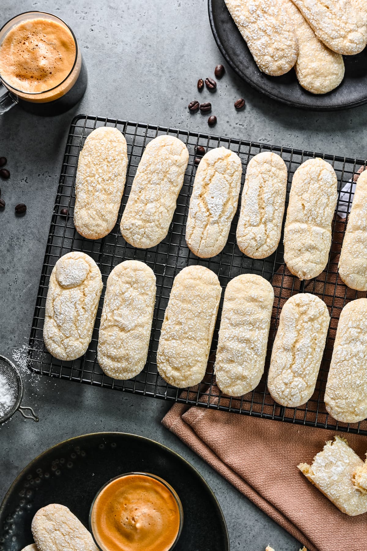 Overhead view of vegan ladyfingers on a wire rack.