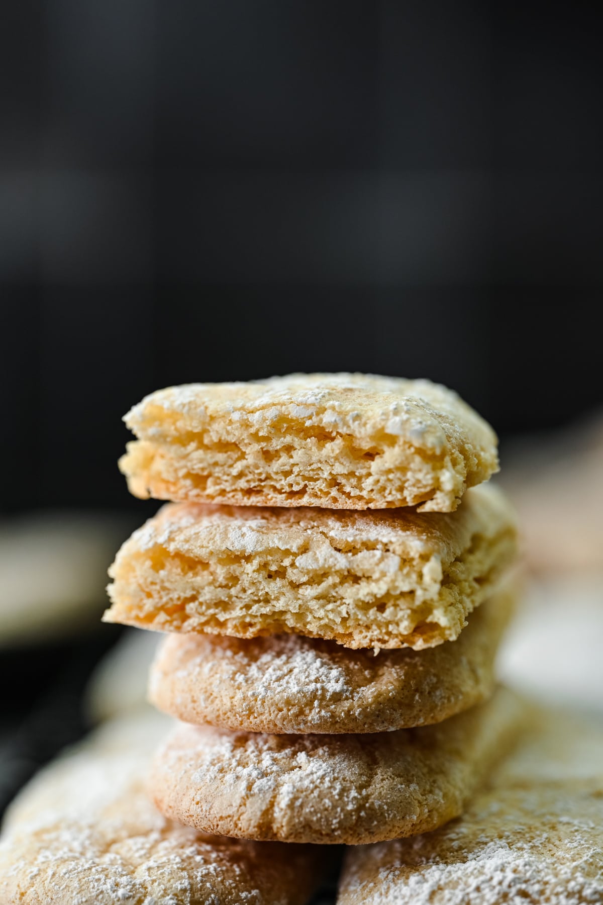 Close up side view of vegan ladyfinger sliced in half to show texture.