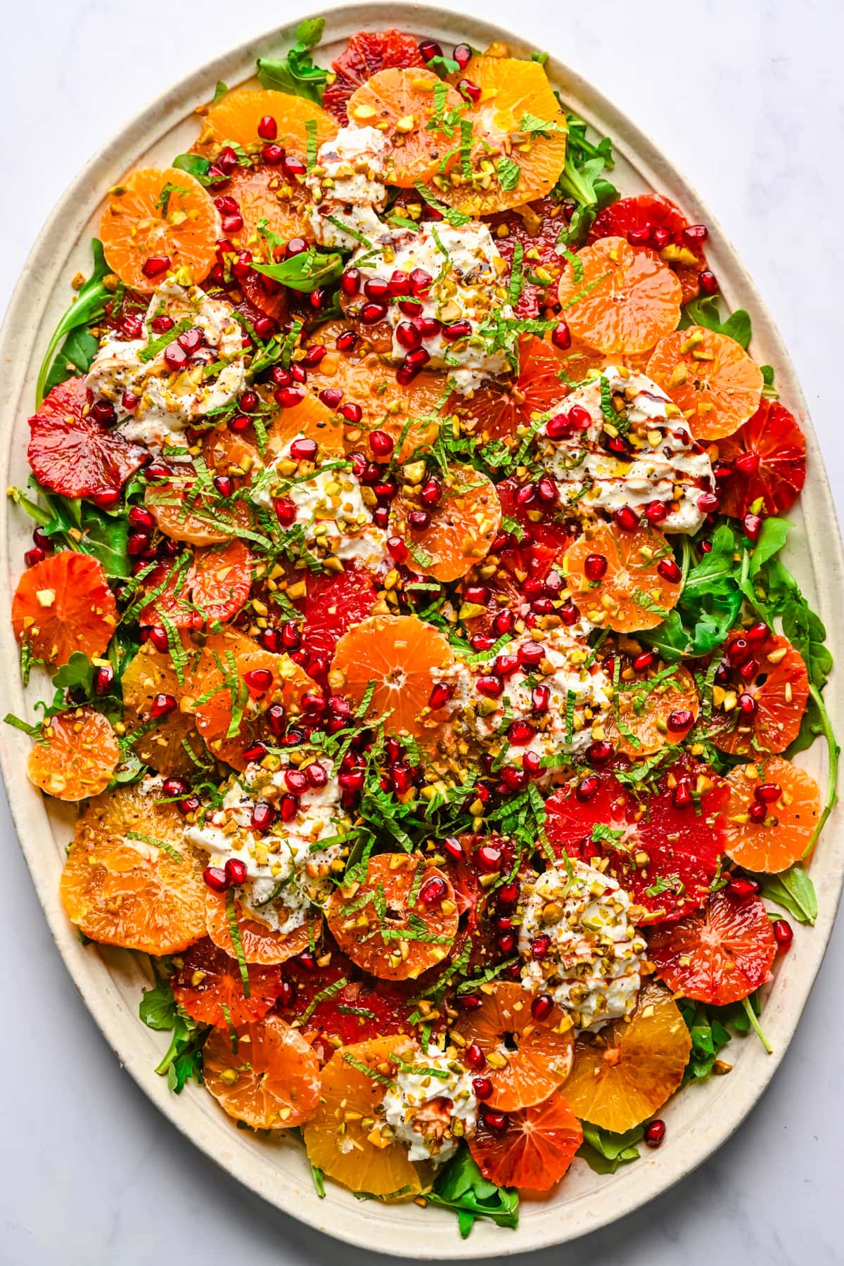 Overhead view of citrus burrata salad.