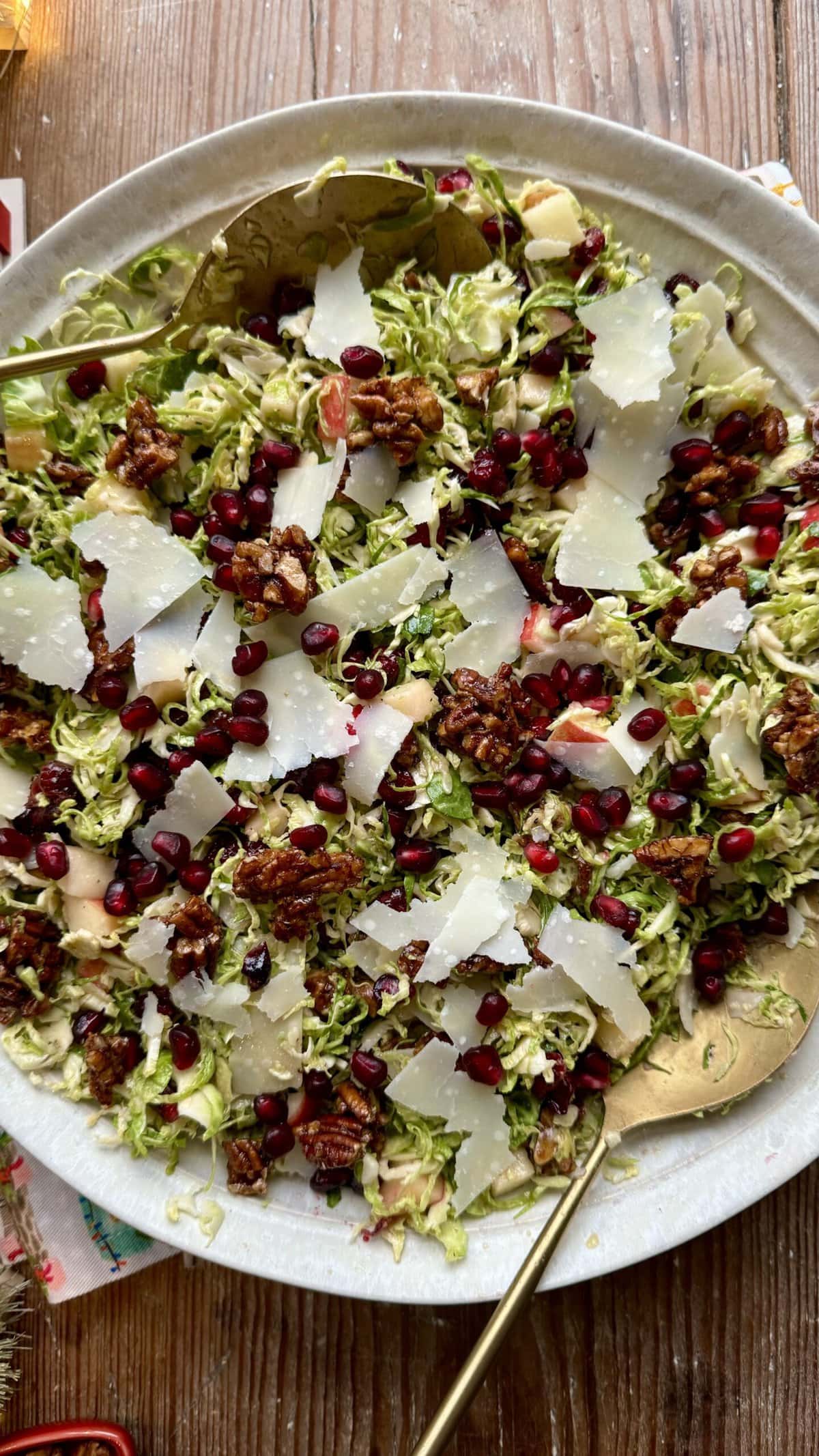 Overhead view of shaved brussels sprout salad in a large bowl.