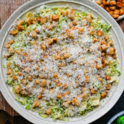 Overhead view of brussels sprouts caesar salad.