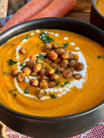 Front view of finished soup garnished with chickpeas.