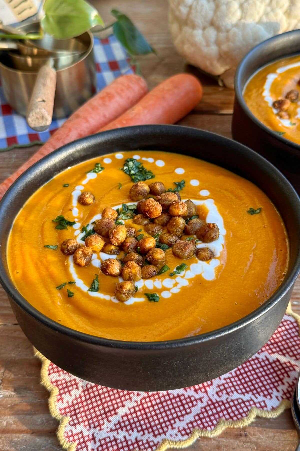 Front view of finished soup garnished with chickpeas.