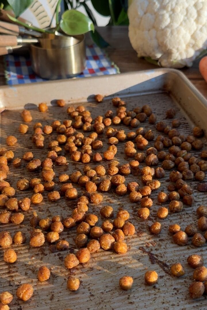 Roasted chickpeas on a sheet pan.
