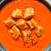 Overhead view of soup with croutons.