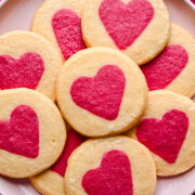 Overhead view of slice and bake cookies on a pink plate.