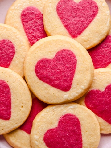 Overhead view of slice and bake cookies on a pink plate.