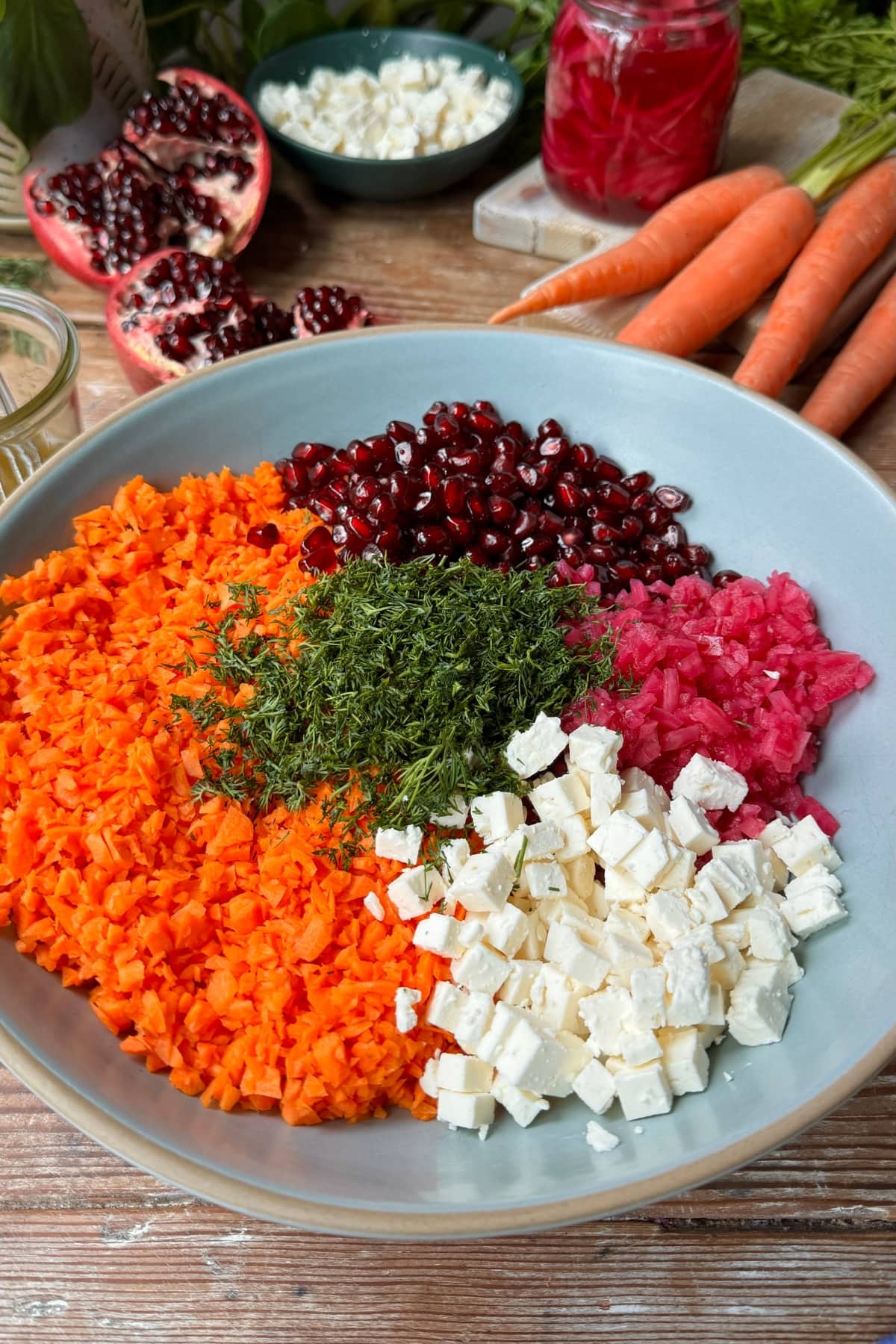 Overhead view of salad ingredients in a bowl.