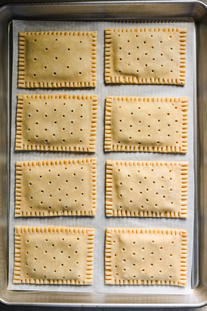 8 pop tarts on a sheet pan before baking.