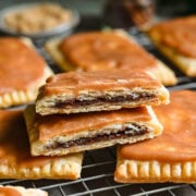 Front view of brown sugar cinnamon pop tarts on a cooling rack.