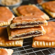 Front view of brown sugar cinnamon pop tarts on a cooling rack.