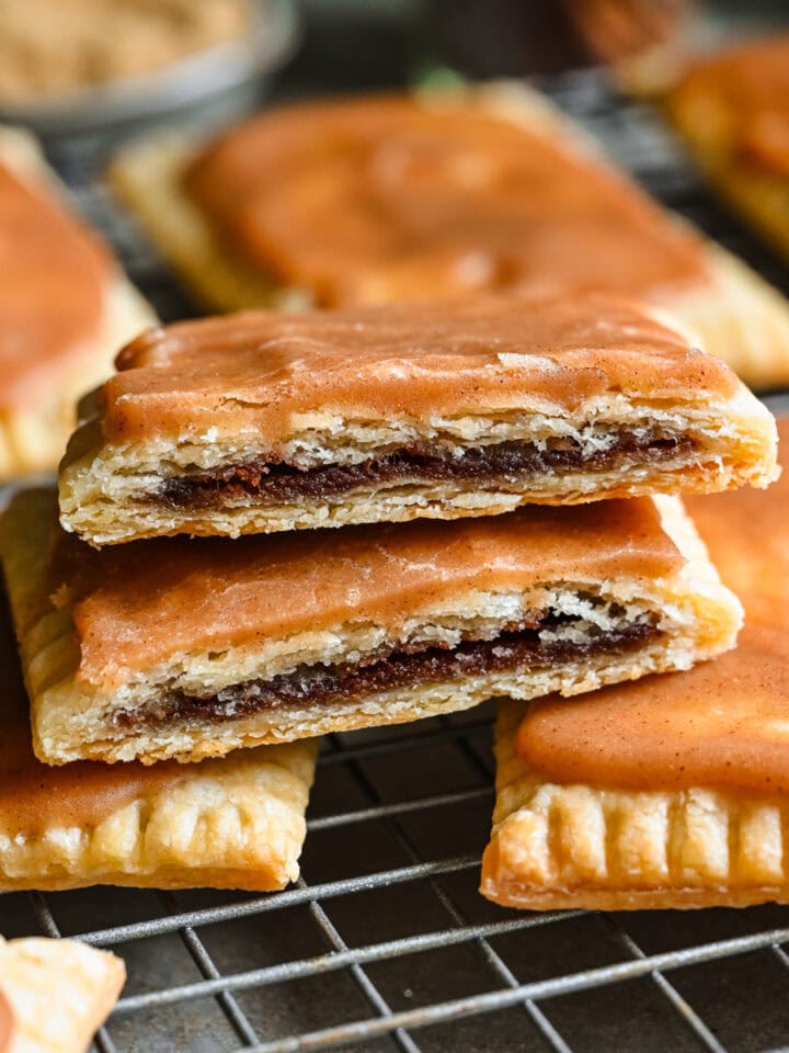 Front view of brown sugar cinnamon pop tarts on a cooling rack.