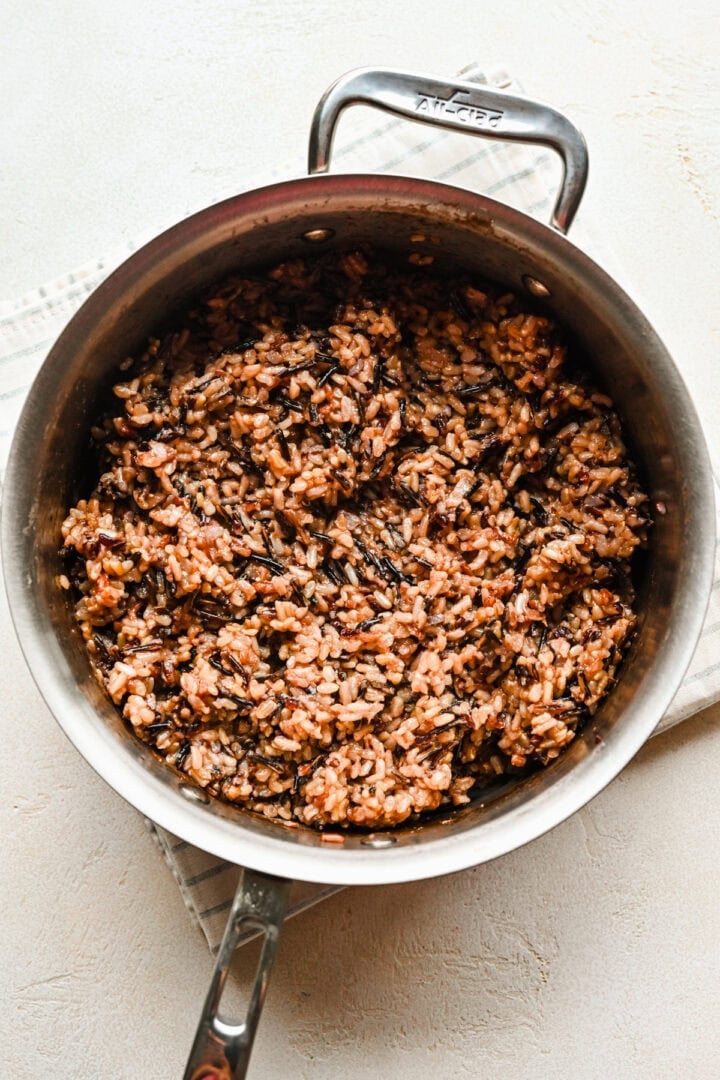 Overhead view of wild rice in a pot.