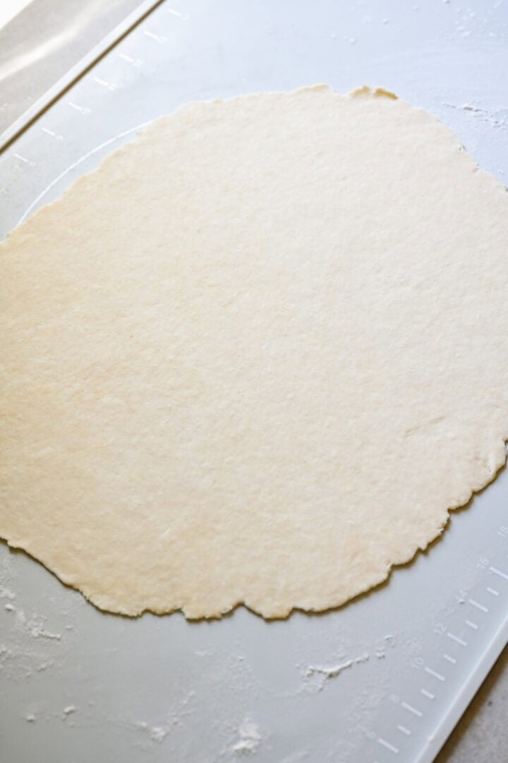 Dough after being rolled out into a flat sheet.