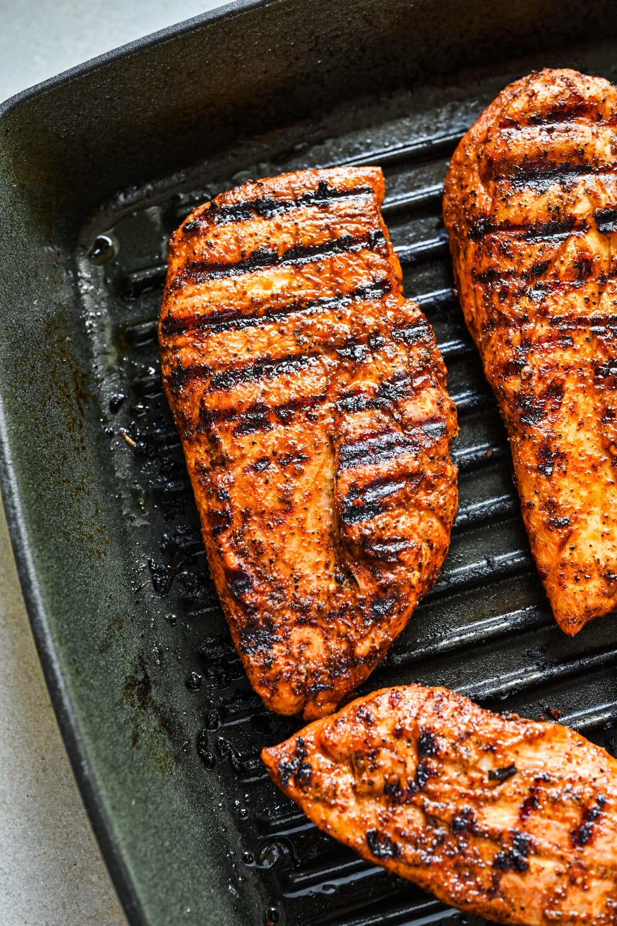 Overhead view of finished grilled chicken.