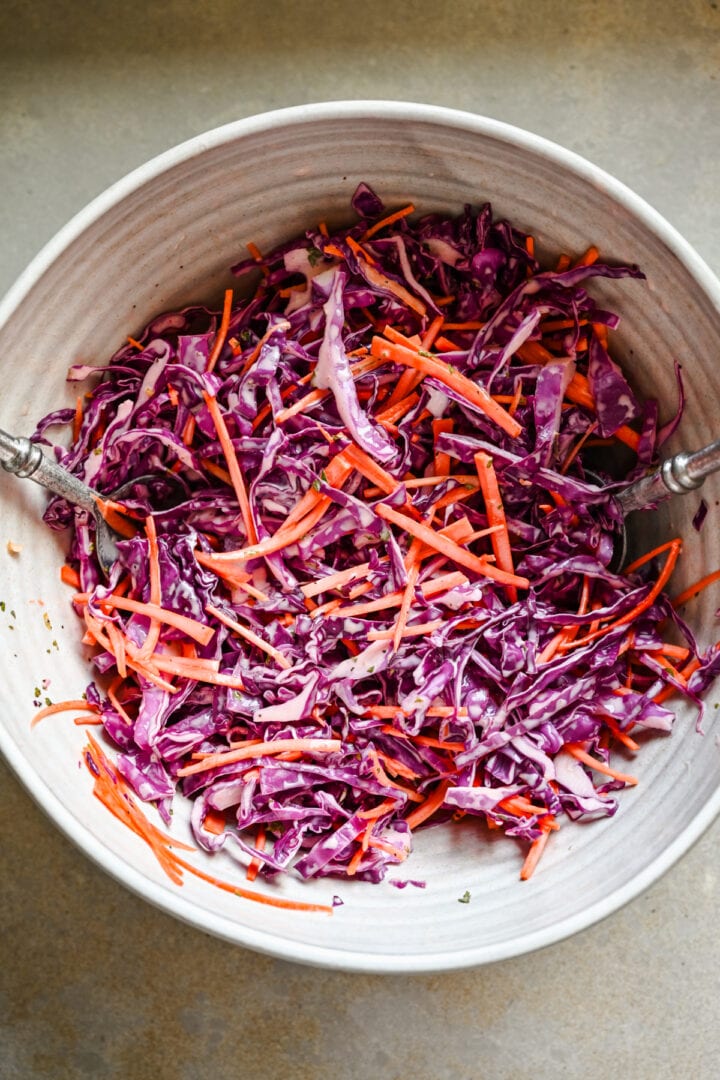 Carrot and cabbage slaw in a bowl.