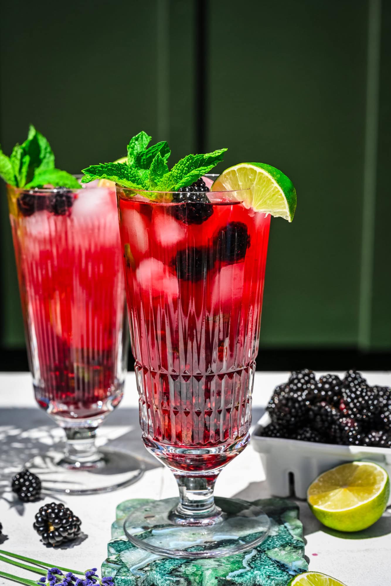 close up side view of blackberry mojito.