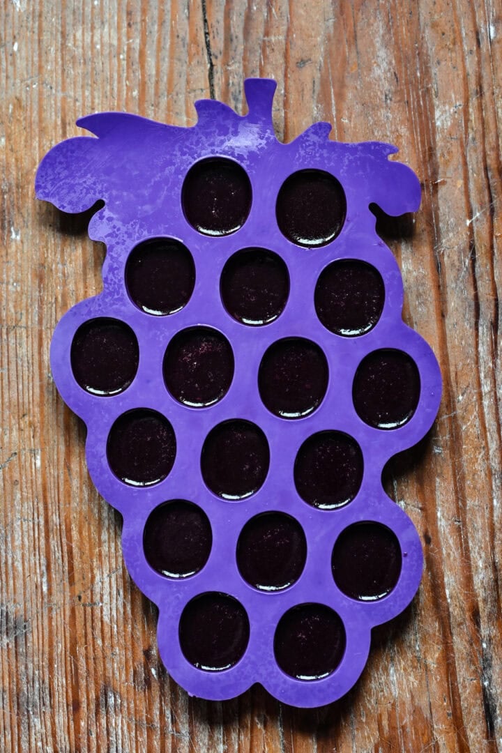 grape fruit gummies in a mold.