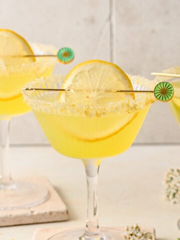 Side view of limoncello martini in a martini glass.