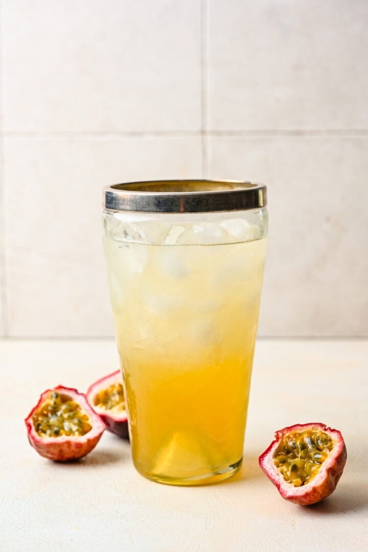Passion fruit margarita in a shaker before being shaken.