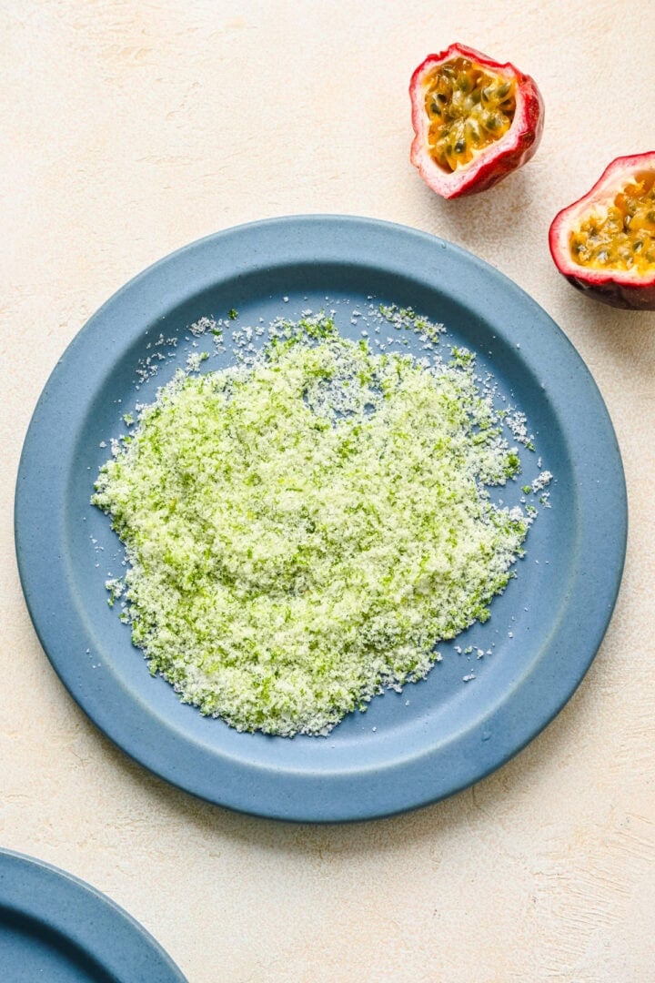 Sugar, salt, and lime zest rim on a plate.